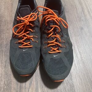 Nike Black Mesh Sneakers with Orange Accent